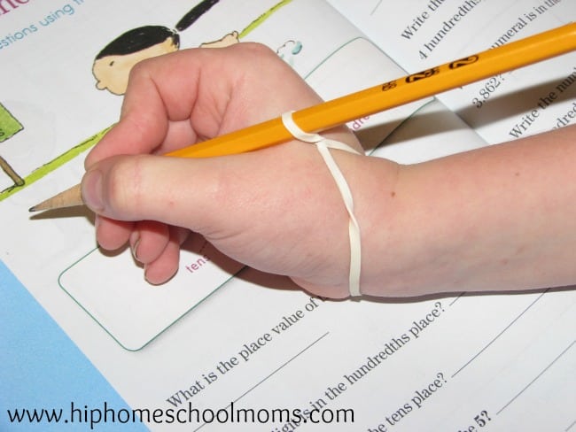 pencil grip rubberband trick