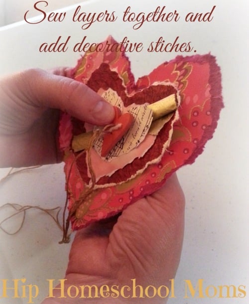 Sew layers of paper hearts together and sew additional decorative stitches. | Hip Homeschool Moms