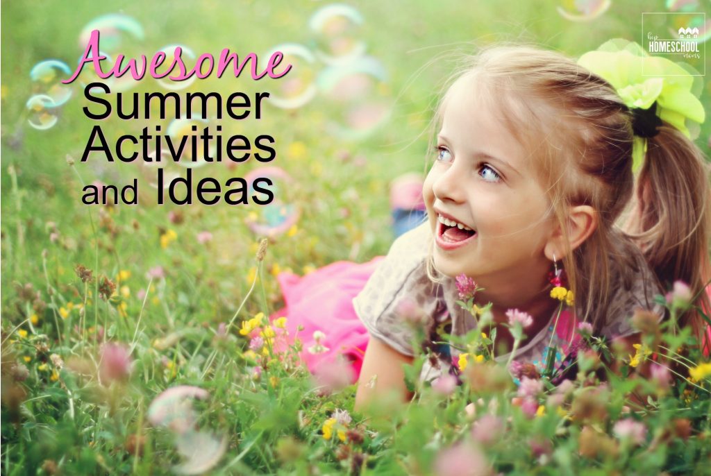 little girl laying in field looking at bubbles