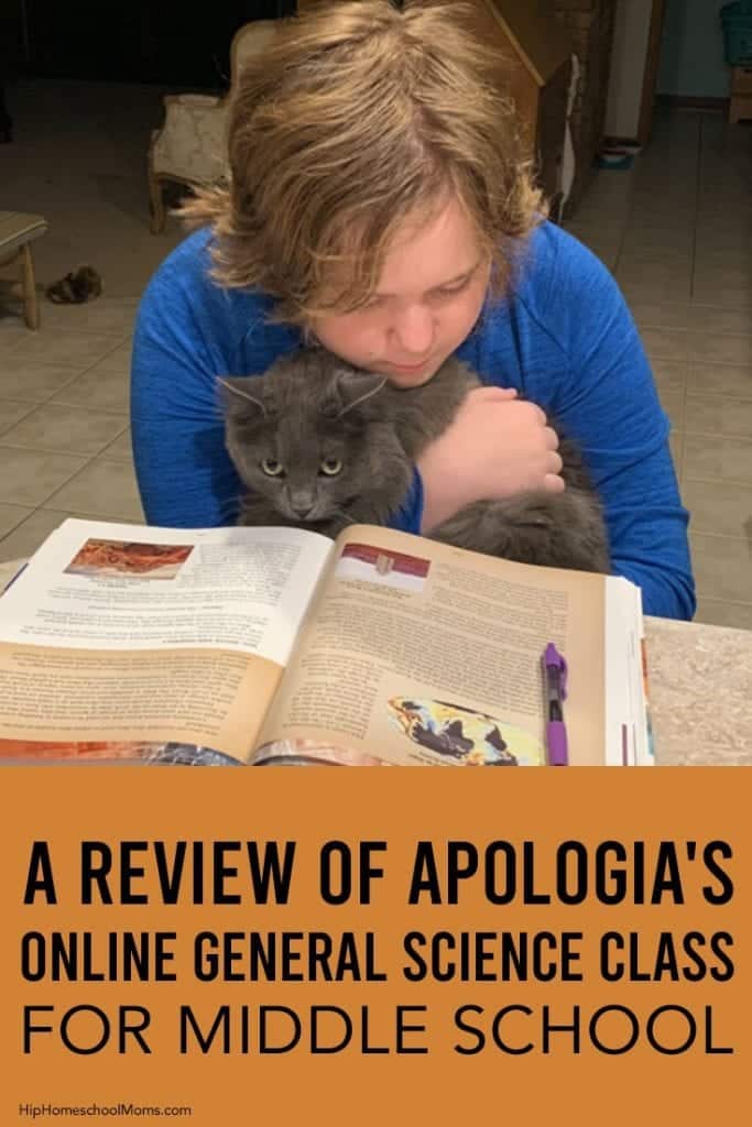 student reading science text with his cat