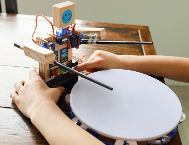Robotics for Kids review - closeup of Robby the Drummer robot playing drums