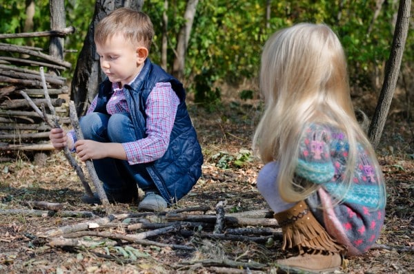 outdoor math games - children playing with sticks