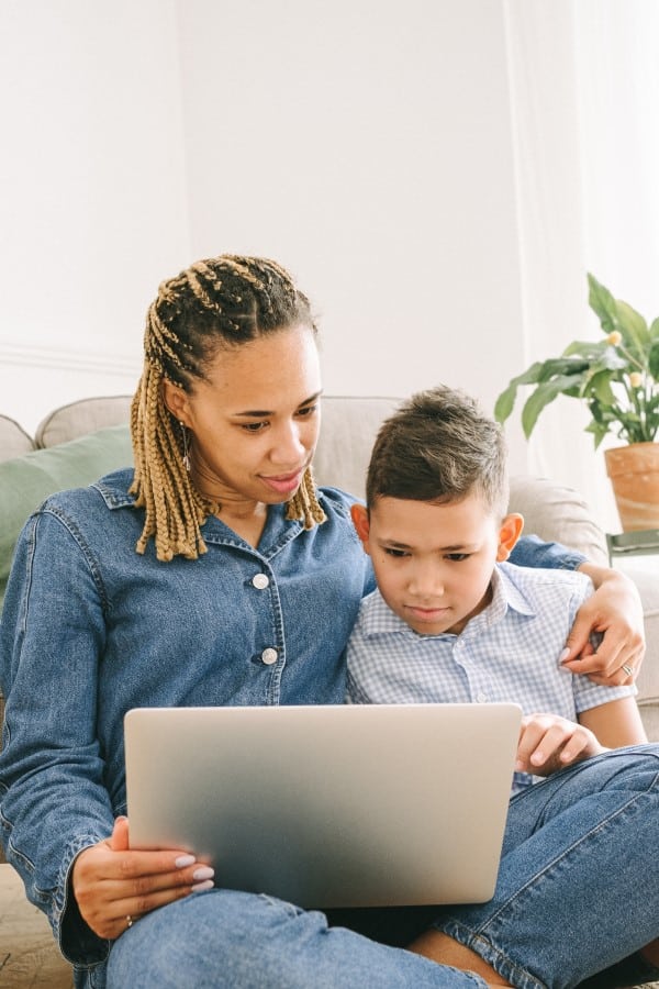 Why Math - mom teaching child with laptop