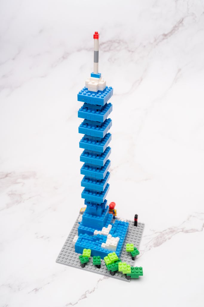 Creative Lego tower model on a marble surface with bright colors and intricate design details.